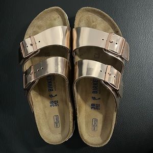 Birkenstocks metallic pink sandals
